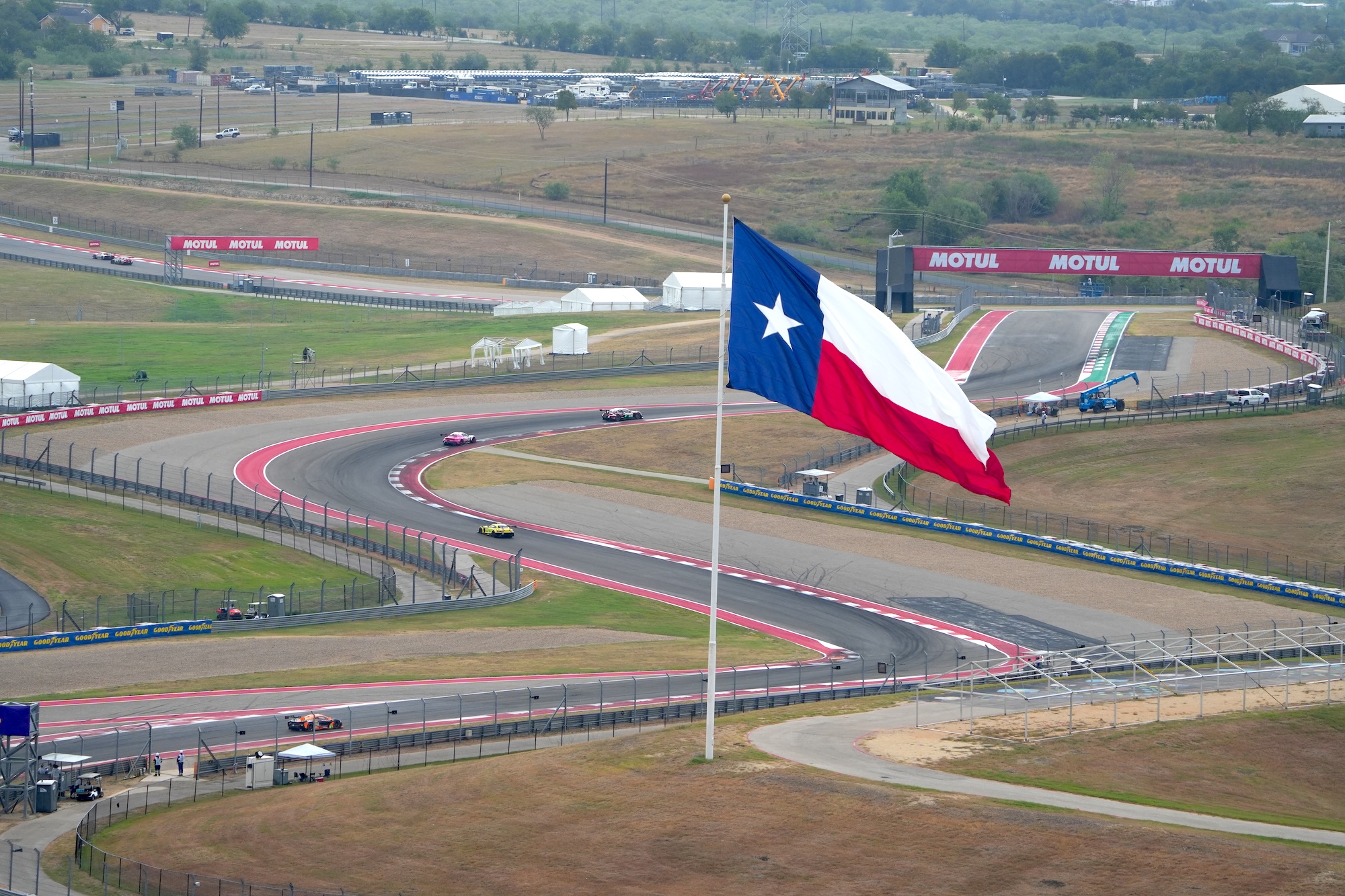 The Flag of Texas above the circuit
